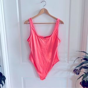 Vibrant and soft neon peach pink bodysuit NEVER WORN